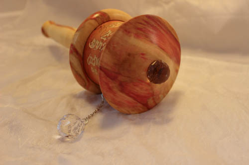 Custom buddhist prayer wheel with microfilm.